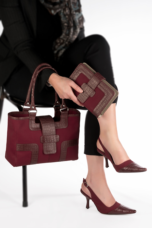 Burgundy red women's dress handbag, matching pumps and belts. Worn view - Florence KOOIJMAN